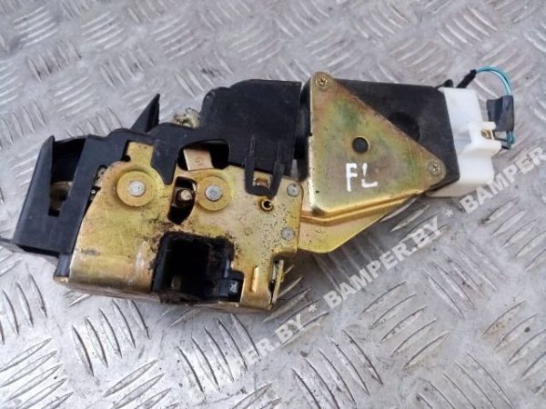 Замок двери передней левой к Mitsubishi Carisma, 2000 г.