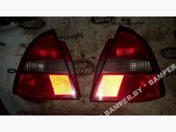 Фонарь задний (комплект) к Mitsubishi Carisma, 2003 г.
